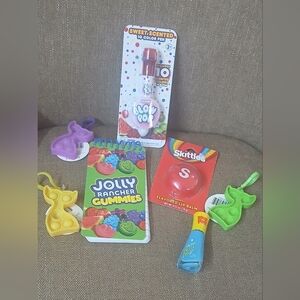 7: candy-blowpop pen, jelly rancher notebook,skittle lipgloss,ring pop polish+3